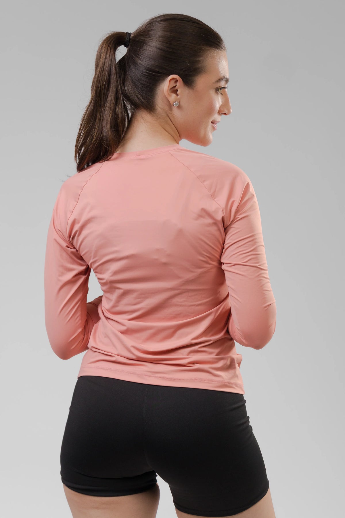 Camiseta Feminina  UV+ Peach Fuzz - Manga Longa