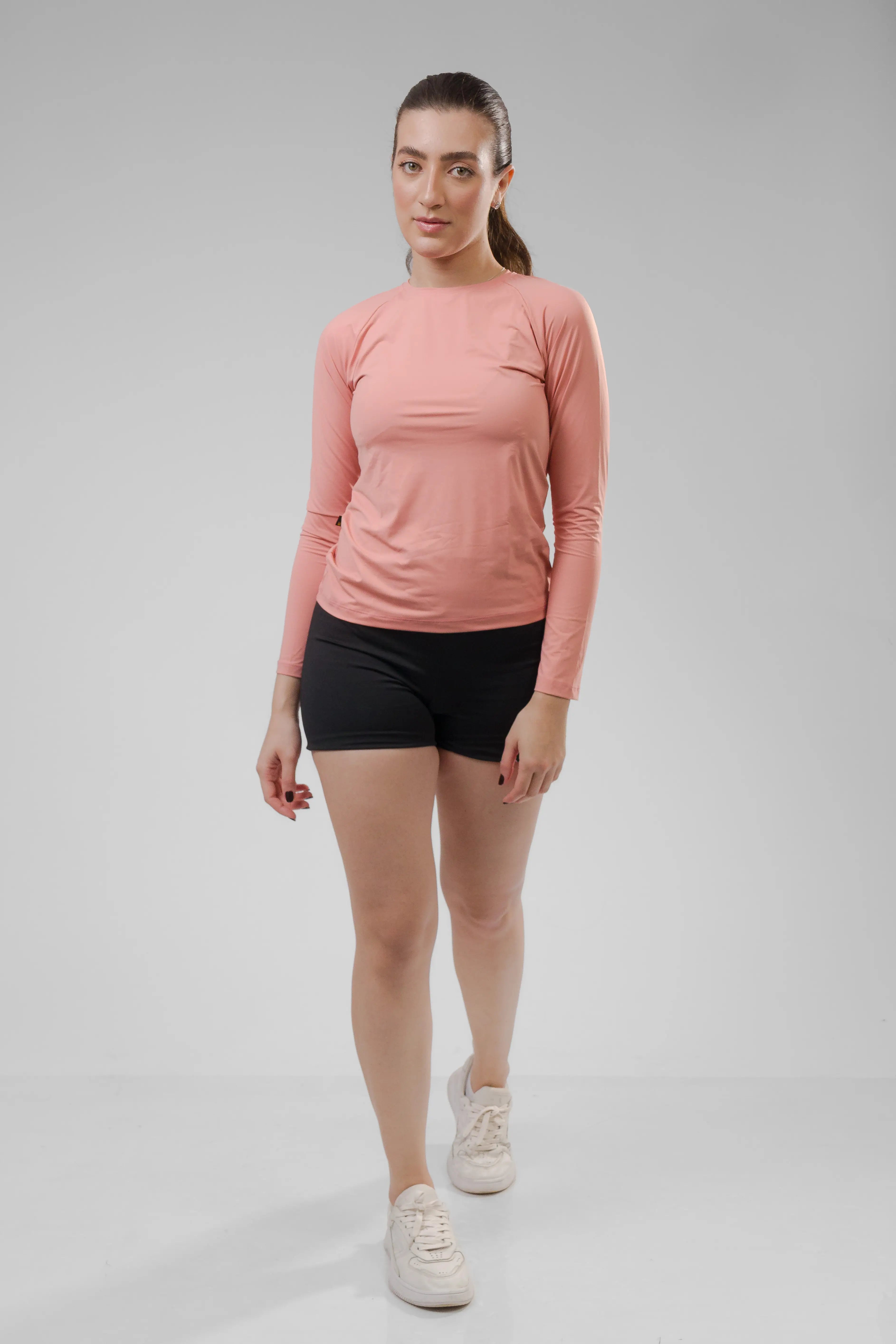 Camiseta Feminina  UV+ Peach Fuzz - Manga Longa