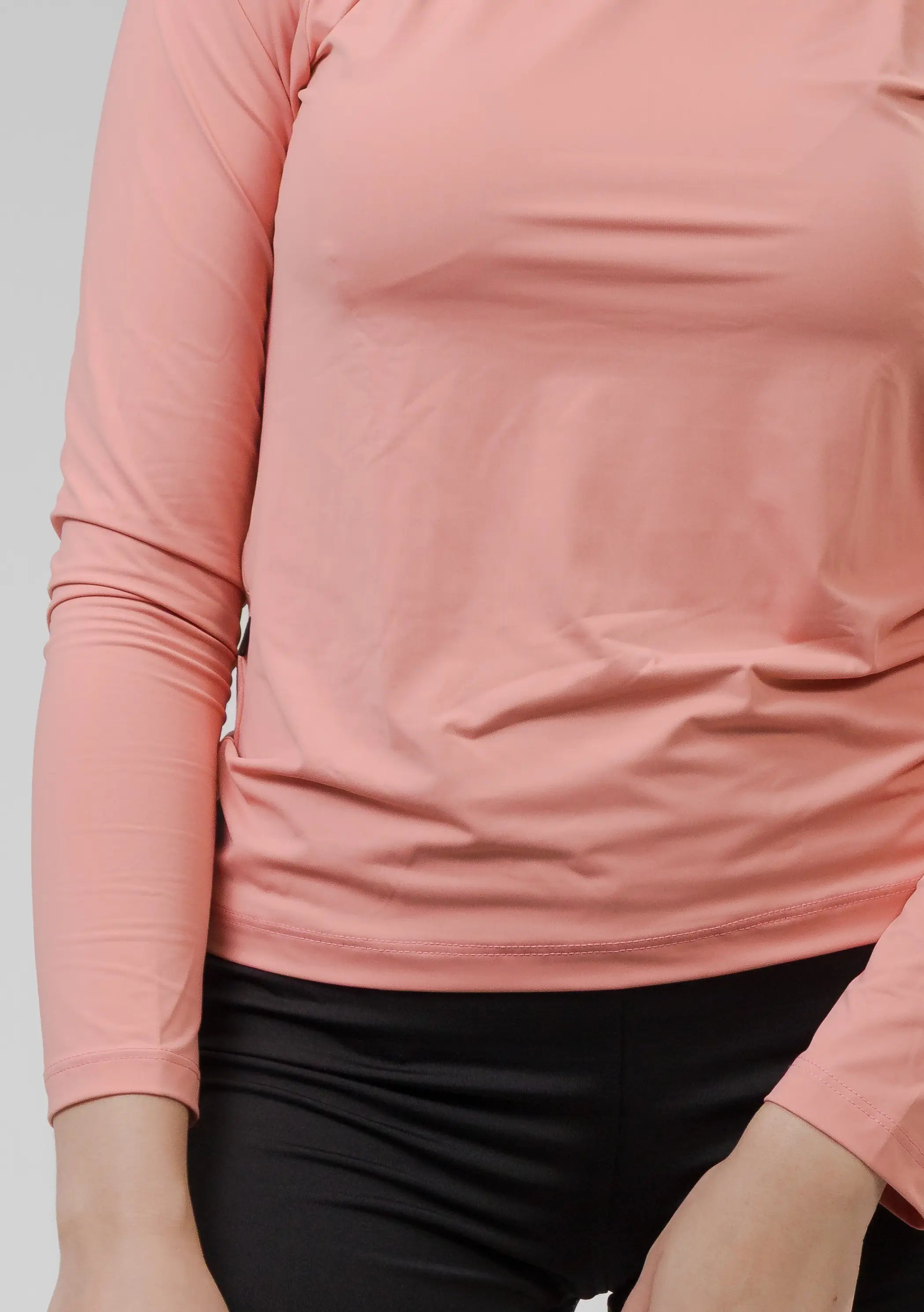 Camiseta Feminina  UV+ Peach Fuzz - Manga Longa